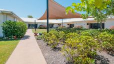 Bupa Cairns aged care home outdoors with great gardens and shade cloth for sun Feb 2021